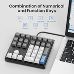 Side angle profile of Kisnt mechanical numeric keypad highlighting the ergonomic typing inclination and PBT keycaps.
