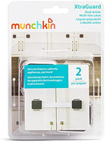 Munchkin child safety latch secured on a kitchen appliance