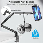 TeQable thirty inch foldable long arm extended fully over a bed headboard holding an iPad Mini for hands free viewing.