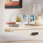 WINKINE mini photo display filled with colorful K-pop photocards on a minimalist vanity table