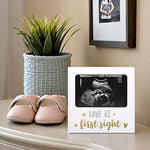 Authentic Tiny Ideas imported pregnancy gift packaging and frame displayed from a side perspective.