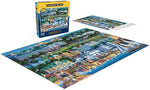 Completed Mackinac Island jigsaw puzzle layout showing the detailed Victorian architecture and horse drawn carriages.