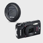 Packaging contents displaying the authentic JJC rotating camera lens cap for Olympus TG series.