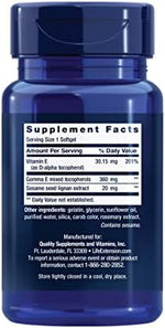 Life Extension Vitamin E softgels bottle showing non-GMO and gluten-free certifications.
