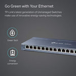 TP-Link gigabit desktop switch angled view with power adapter connected.