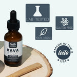 Leilo Kava Root concentrated drops being mixed into a glass of water for a calming beverage