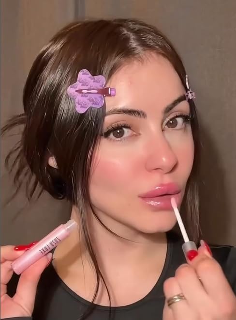 Zuzu Luxe vegan lip gloss upright display in natural light