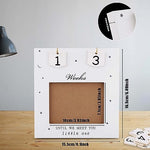 NQEUEPN ultrasound countdown frame with wooden number cards displayed on a nursery tabletop