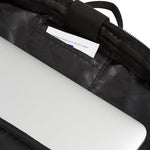 Close up view of the SwissGear 5358 front essentials organizer pocket filled with neatly arranged cables and business cards