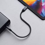 Close-up view of the durable nylon braided texture on the Satechi USB-C cable.