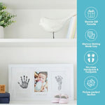 Complete contents of the Pearhead baby hand and footprint kit including two impression cards and the mess free ink pad