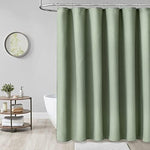 Modern bathroom setting showcasing the elegant drape and weighted hem of the curtain.
