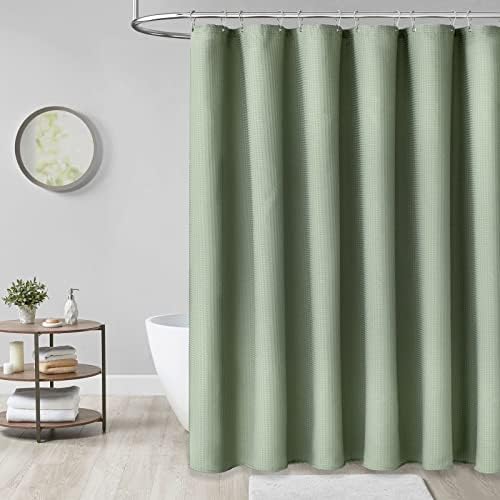 Modern bathroom setting showcasing the elegant drape and weighted hem of the curtain.