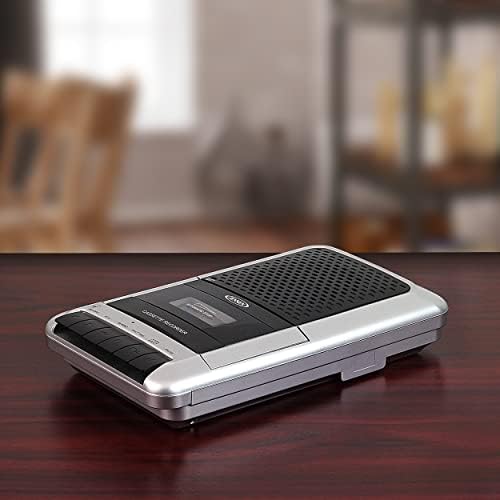 Jensen MCR-100 battery compartment view demonstrating portable setup for four C batteries.