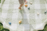 Brooklyn Neutral dog water mat being used as a refreshing cooling sprinkler for family pets