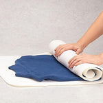 Extra large quick dry microfiber garment mat spread flat on a laundry counter surface