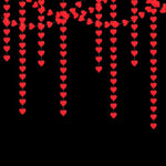 A stylized wedding photo booth backdrop utilizing the red heart hanging banner.