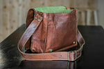 Cuero 10.5 inch iPad Pro leather messenger bag worn crossbody