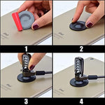 I3C adhesive anchor plate securing a tablet on a public cafe table surface