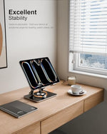Adjustable desktop tablet holder showing 360 degree rotating base