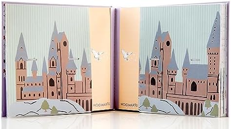 ConQuest Journals baby memory book highlighting the front cover four by four inch photo window.