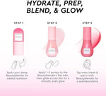 Damp watermelon Beautyblender sponge applying pink liquid blush onto the cheeks