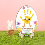 Wonderjune chick egg shape plaque displayed as a nursery wall hanging ornament with ribbon.