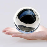 DSJUGGLING 100mm stage contact juggling ball showing the clear acrylic layer and reflective inner core