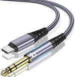Close up of gold-plated 1/4 inch connector on Qimiaous cable