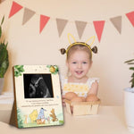 Back view of the pregnancy memories frame showing easel stand and hanging hooks