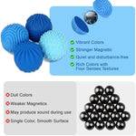 Compact portable stress relief balls next to a smartphone showing relative product dimensions