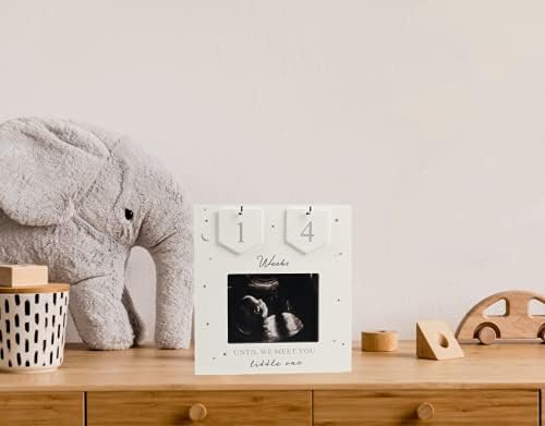 Close up of the interchangeable numeric tiles on the pregnancy countdown photo frame.