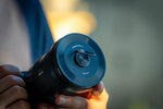 Photographer using Freewell M2 magnetic filters on outdoor lens