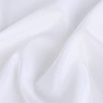 GFCC white photography screen backdrop being ironed with a garment steamer