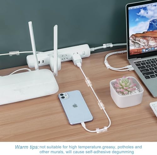 Ogurey forty piece clear cord clips package spread out on a clean wooden desktop