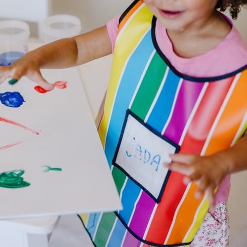 Melissa and Doug durable artist smock protecting clothes during an outdoor arts and crafts activity.