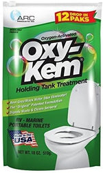 Oxy-Kem treatment pods demonstrating waste digestion and odor removal process