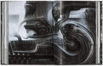 Multilingual Edition HR Giger art book displayed on surface