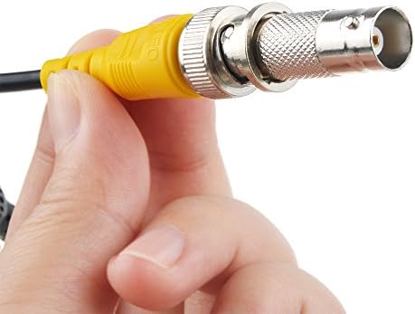 Close-up perspective of the integrated heavy-duty black BNC video and DC power terminal connectors.