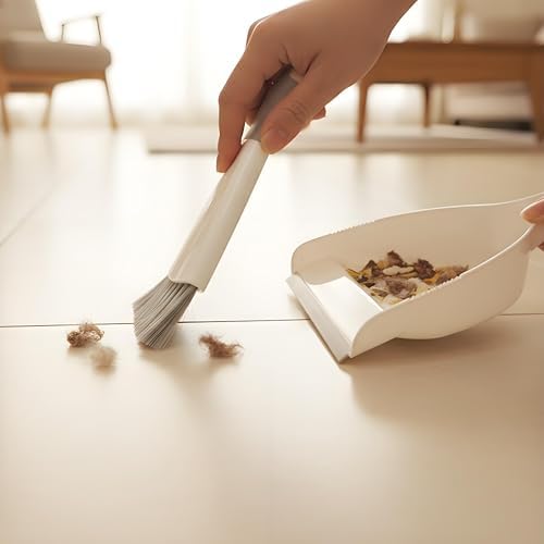 Brush and dustpan set snapped together showing the hanging storage hole.