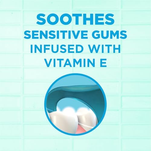 Dental floss picks for adults featuring Vitamin E and fluoride coating.
