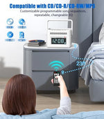 Portable Greadio CD player used in a modern bedroom setting