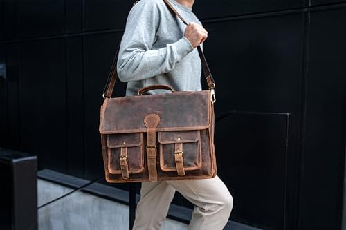 Side angle view of the Komal's Passion Leather office satchel highlighting its deep five inch capacity and sturdy metallic zippers.