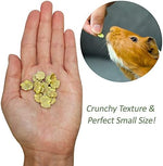 Premium crunchy green pea flakes for guinea pigs and rabbits shown in a feeding bowl