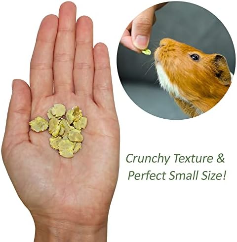 Premium crunchy green pea flakes for guinea pigs and rabbits shown in a feeding bowl