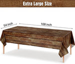 Close up view of realistic rustic wood grain print on plastic tablecloth