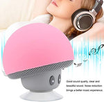 Tangxi pocket speaker with a compact silhouette next to desktop accessories.