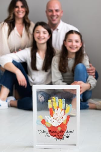 Pearhead DIY family print keepsake kit displaying the included non-toxic paint tubes and black customization marker.