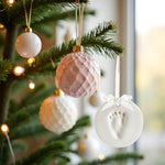 Two pack gender neutral baby holiday ornament kit with rolling pin and circular shaping ring.