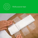 White two inch surgical paper tape rolls showing breathable rayon backing texture